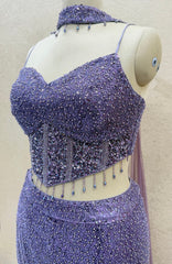 Glamorous Modern Lavender Crystal Fishcut Lehenga Set with Heavy Corset Blouse & Sequin Embellishments
