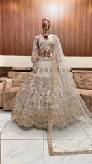 Royal Gold Embellished Bridal Lehenga with Intricate Handwork