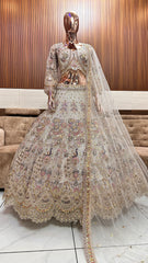 Royal Gold Embellished Bridal Lehenga with Intricate Handwork