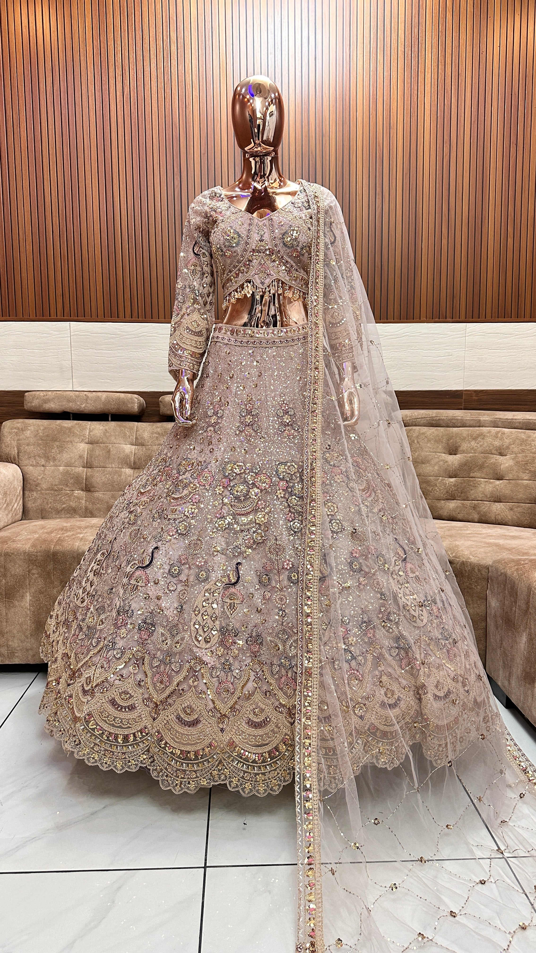 Royal Gold Embellished Bridal Lehenga with Intricate Handwork