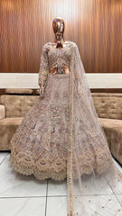 Royal Gold Embellished Bridal Lehenga with Intricate Handwork