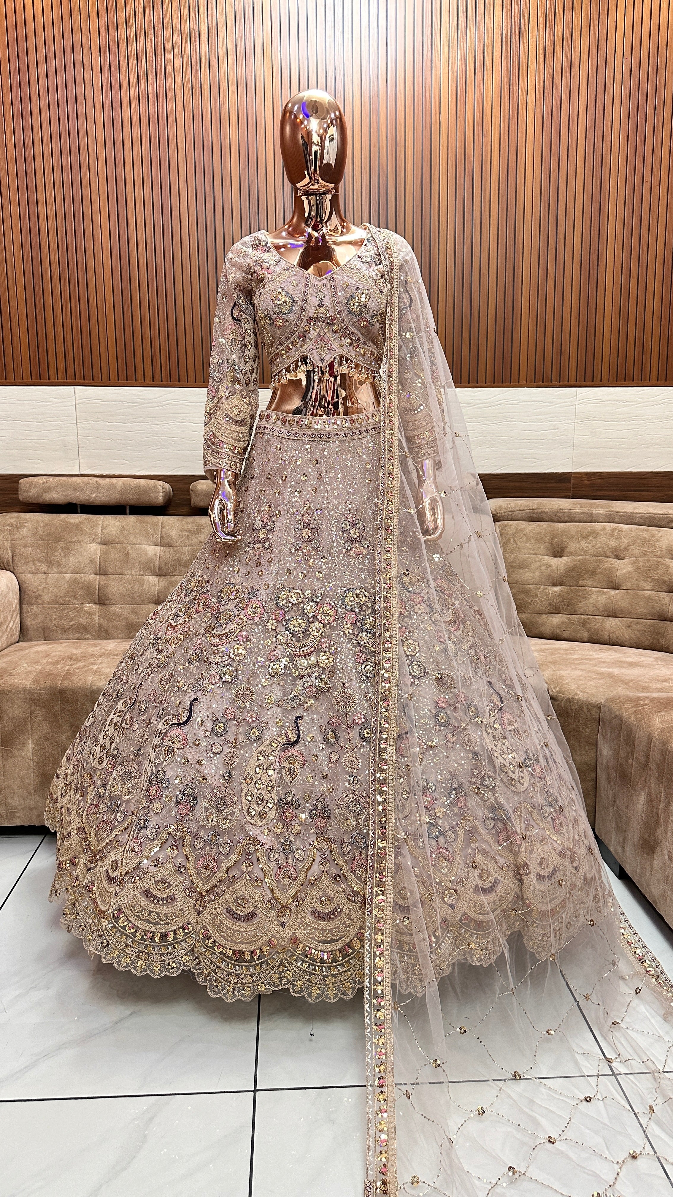 Royal Gold Embellished Bridal Lehenga with Intricate Handwork