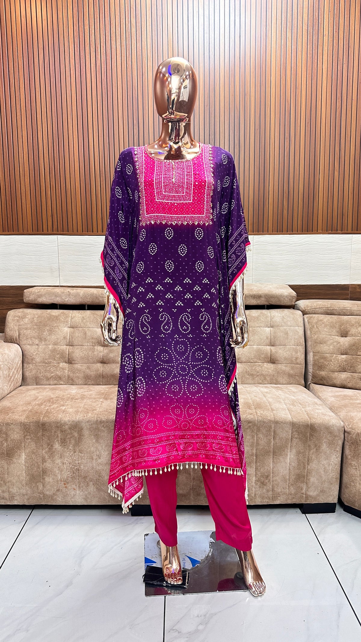 Elegant Purple and Pink Bandhani Kurta Set with Tassel Detailing