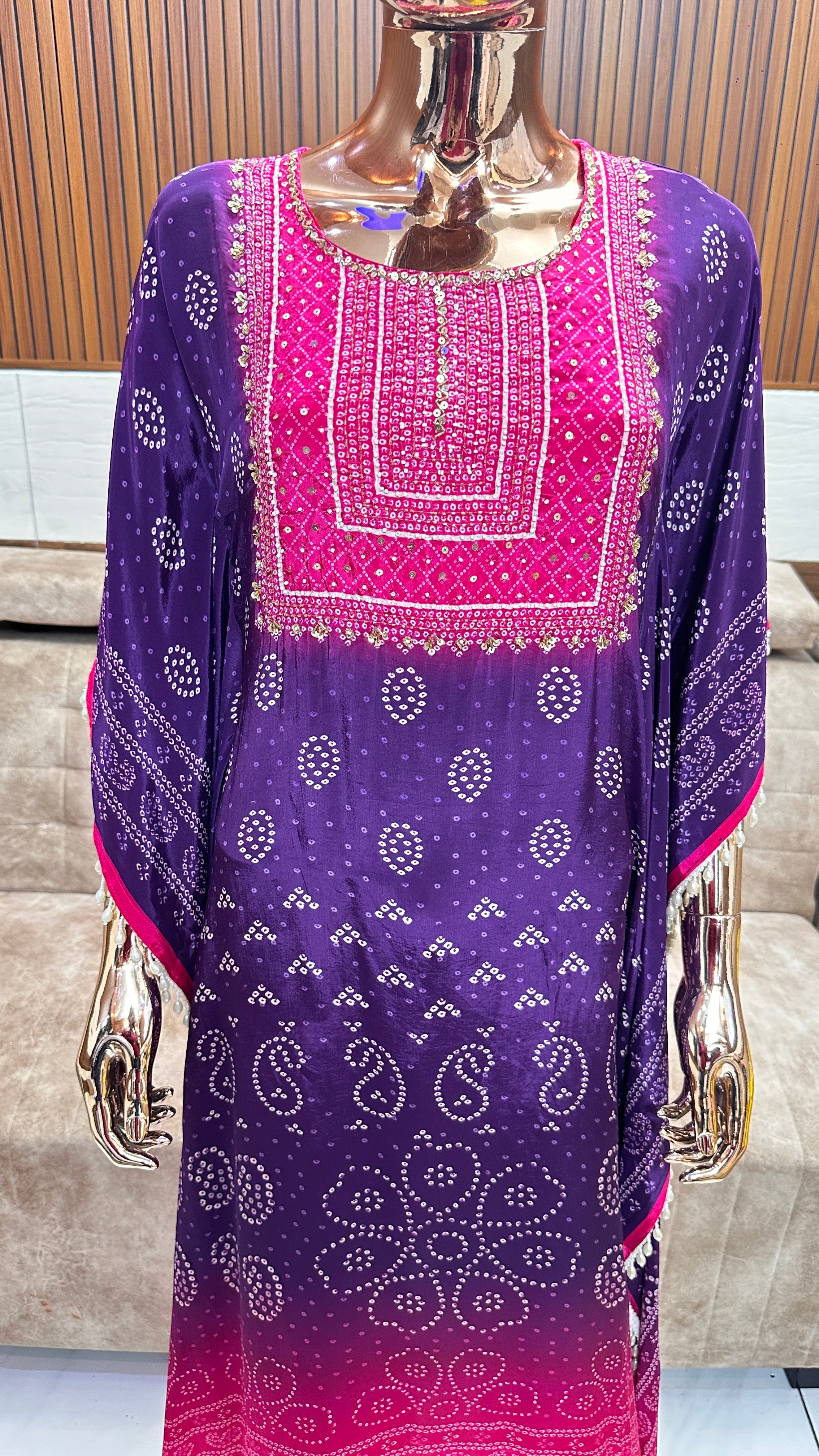 Elegant Purple and Pink Bandhani Kurta Set with Tassel Detailing