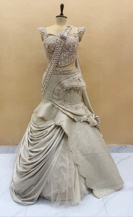 Ivory Pearl Embellished Fish Cut Designer Lehenga Set with Sculpted Corset Blouse & Dramatic Draped Trail
