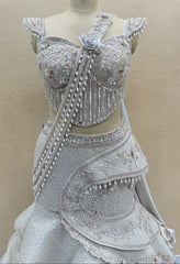 Ivory Pearl Embellished Fish Cut Designer Lehenga Set with Sculpted Corset Blouse & Dramatic Draped Trail