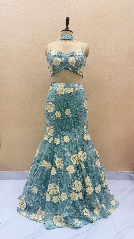 luxury handcrafted sea blue modern fishcut lehenga set with corset blouse.